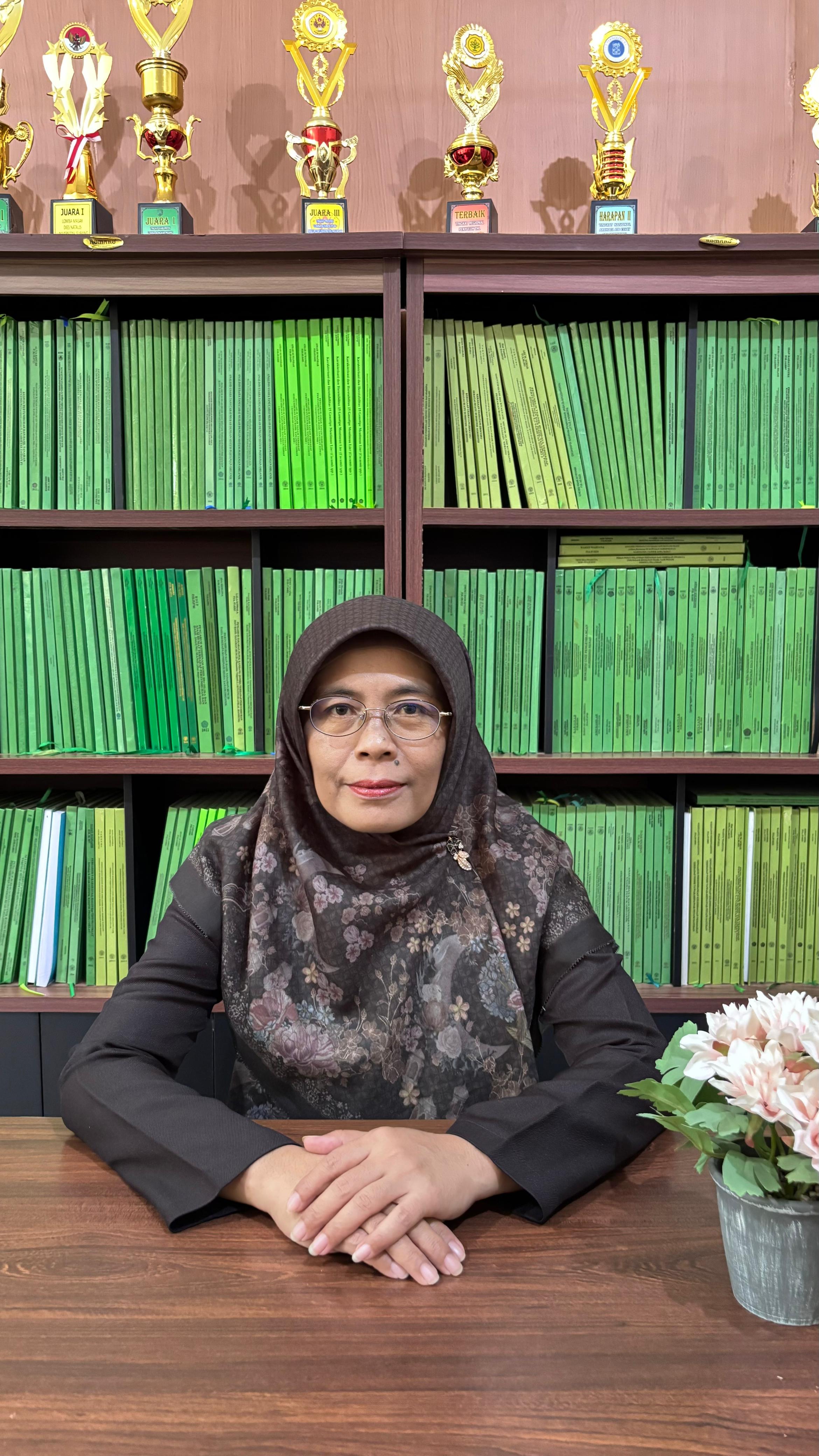 Nine Wahyuni Maulani, S.P., M.P