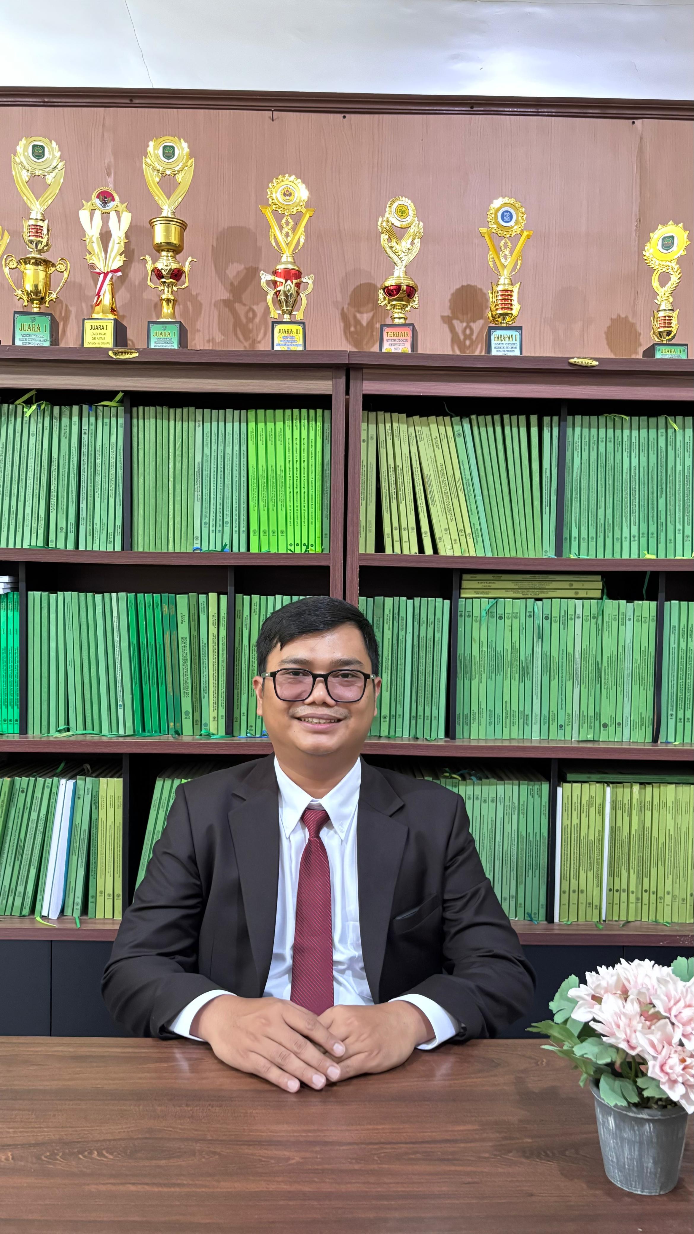 Isman Sidik, S.P., M.P